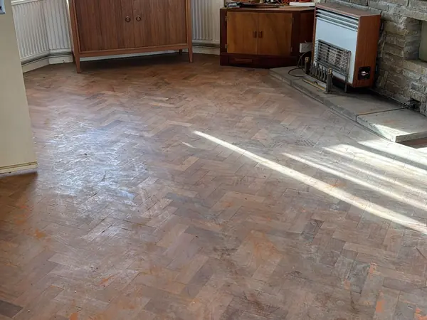 The same garage and garden cleared