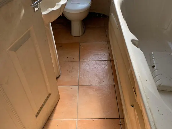 The same house emptied room by room