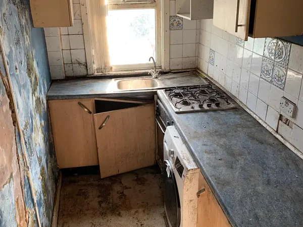 The same house emptied room by room
