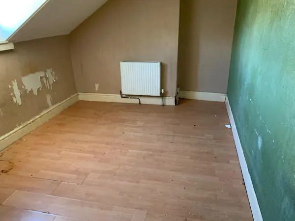 The same house emptied room by room