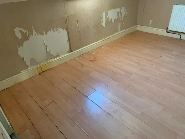 The same house emptied room by room