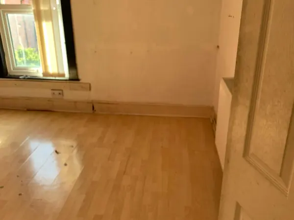 The same house emptied room by room