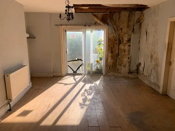 The same house emptied room by room