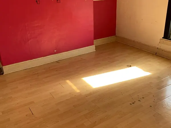 The same house emptied room by room