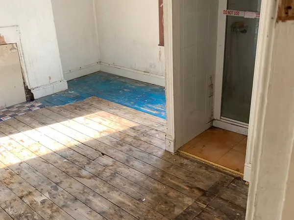 The same house emptied room by room