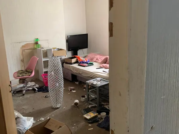 Cluttered house before clearance