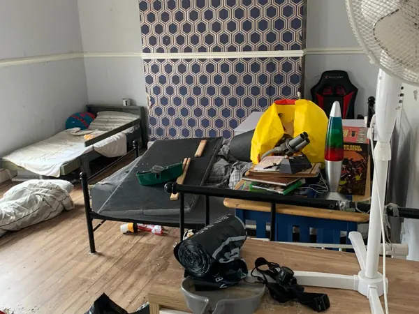 Cluttered house before clearance