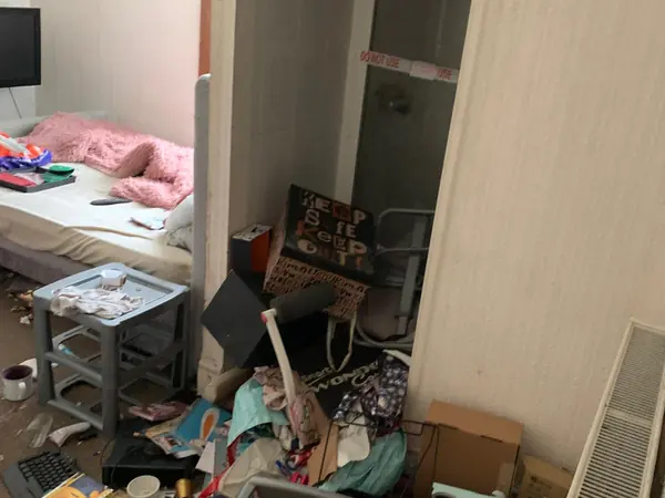 Cluttered house before clearance