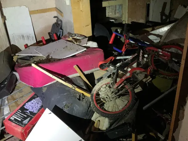 Cluttered house before clearance