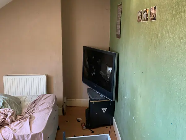 Cluttered house before clearance