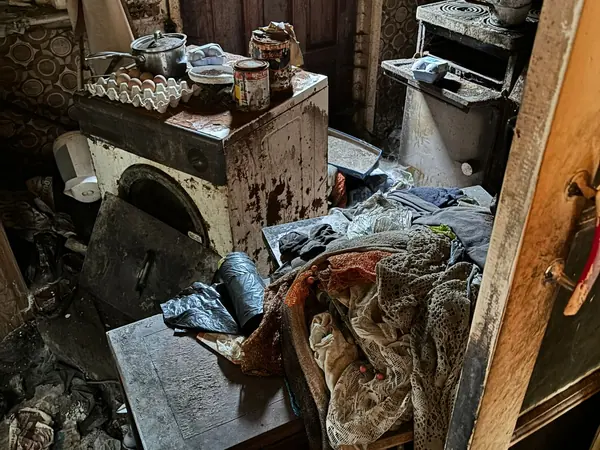 Fire-damaged house before clearance