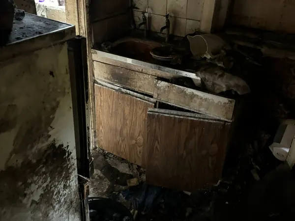 Fire-damaged house before clearance
