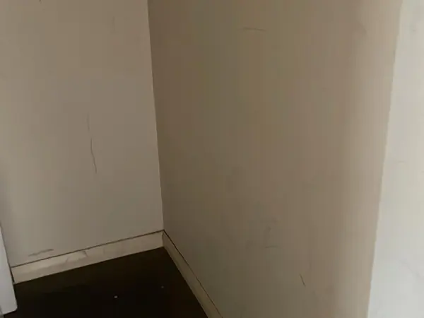 The same flat emptied and swept