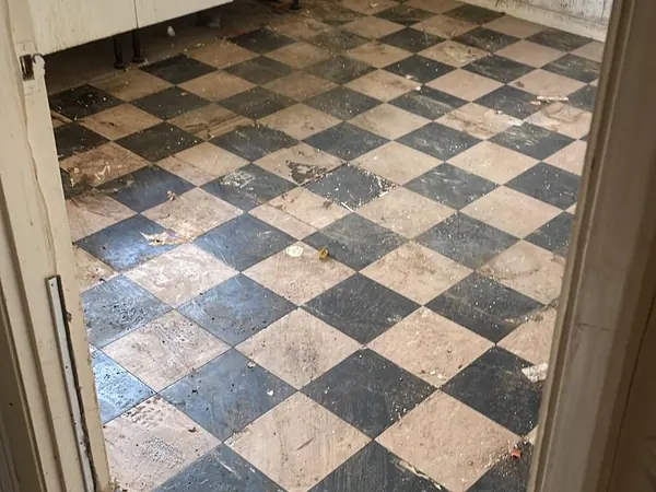 The same flat emptied and swept