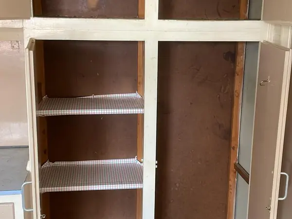 The same flat emptied and swept