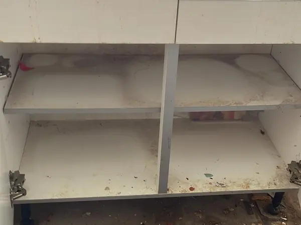 The same flat emptied and swept