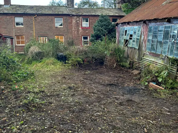 The same yard and workshop cleared