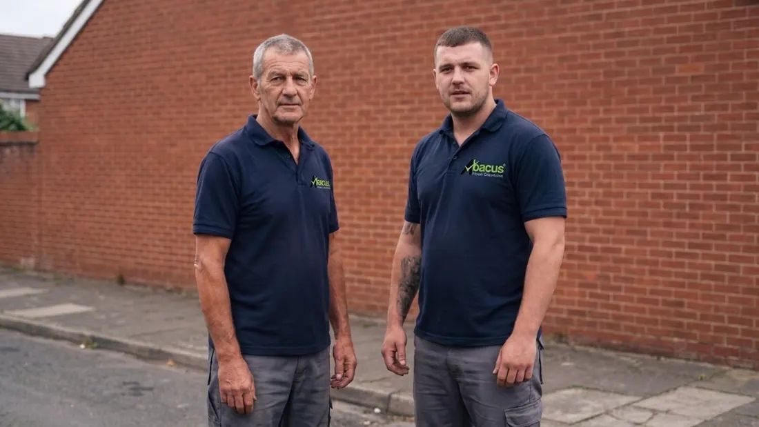 Two members of our uniformed crew outside a property